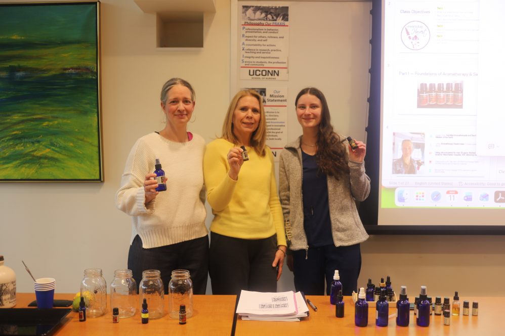 Susan Cote, Michelle Judge, and a UConn Nursing student during the Nutrition, Health, and Wellness Committee's aromatherapy event.