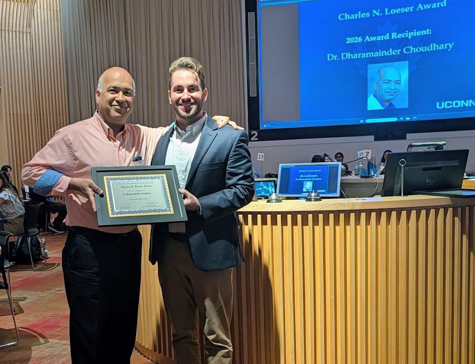 Dharamainder Choudhary, Ph.D. accepting award