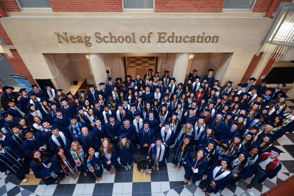 The Neag School Class of 2025 gathers in the Gentry Building atrium.