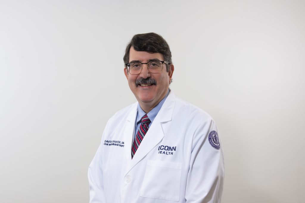 dentist in white coat