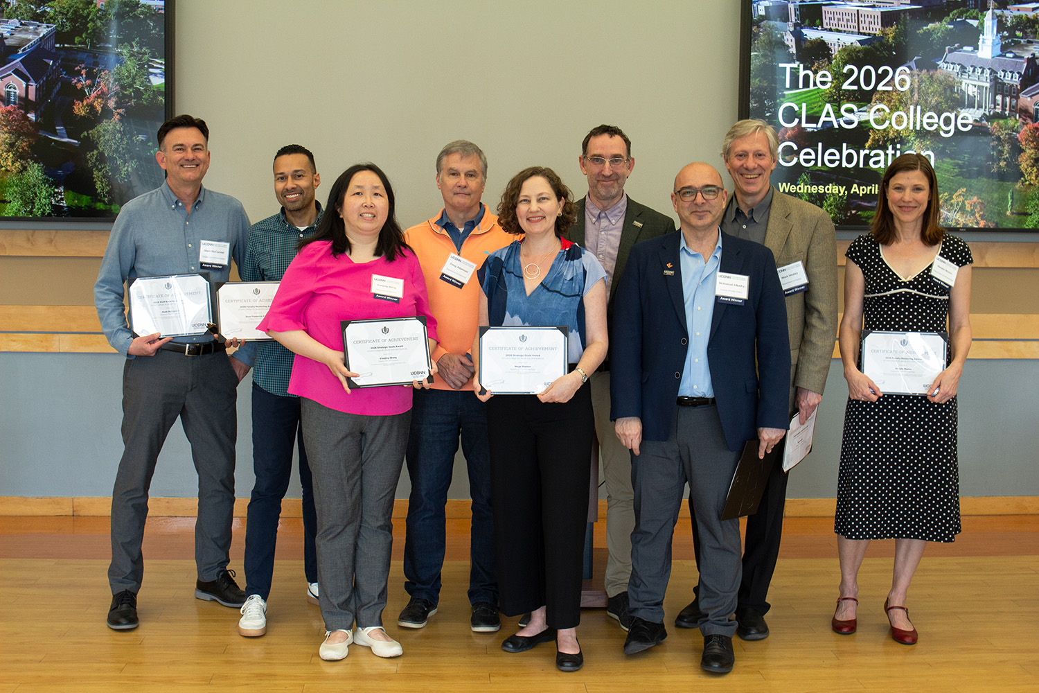 Award recipients pose with the dean at the CLAS College Celebration.