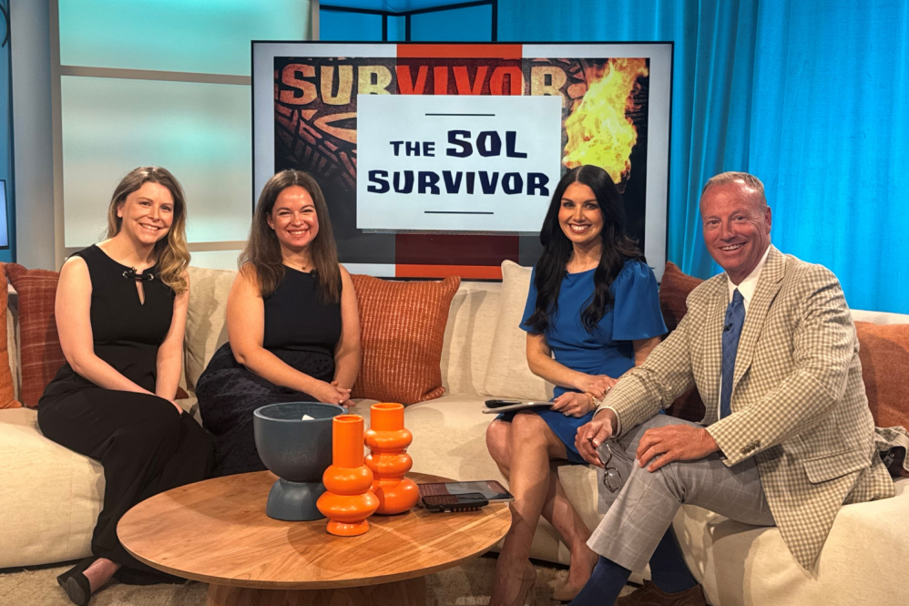3 women and a man sitting on the couch