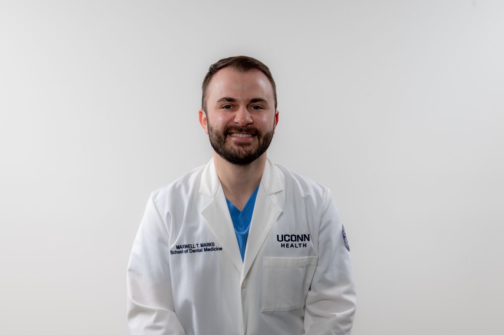 dental student in white coat