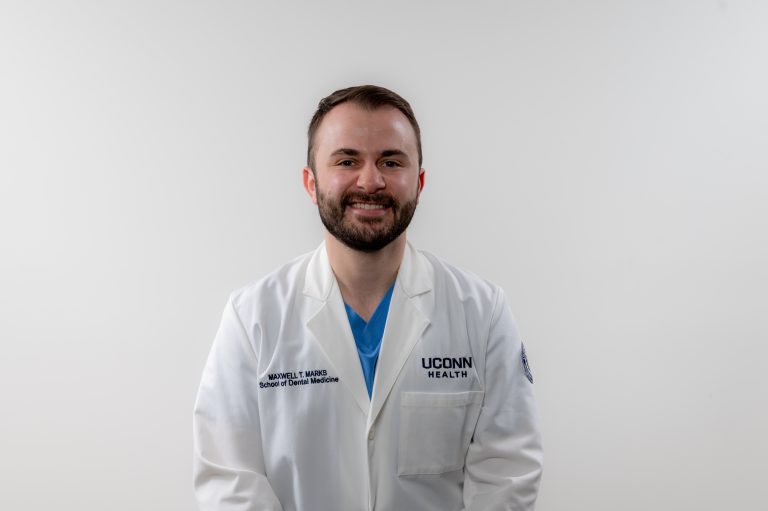 dental student in white coat