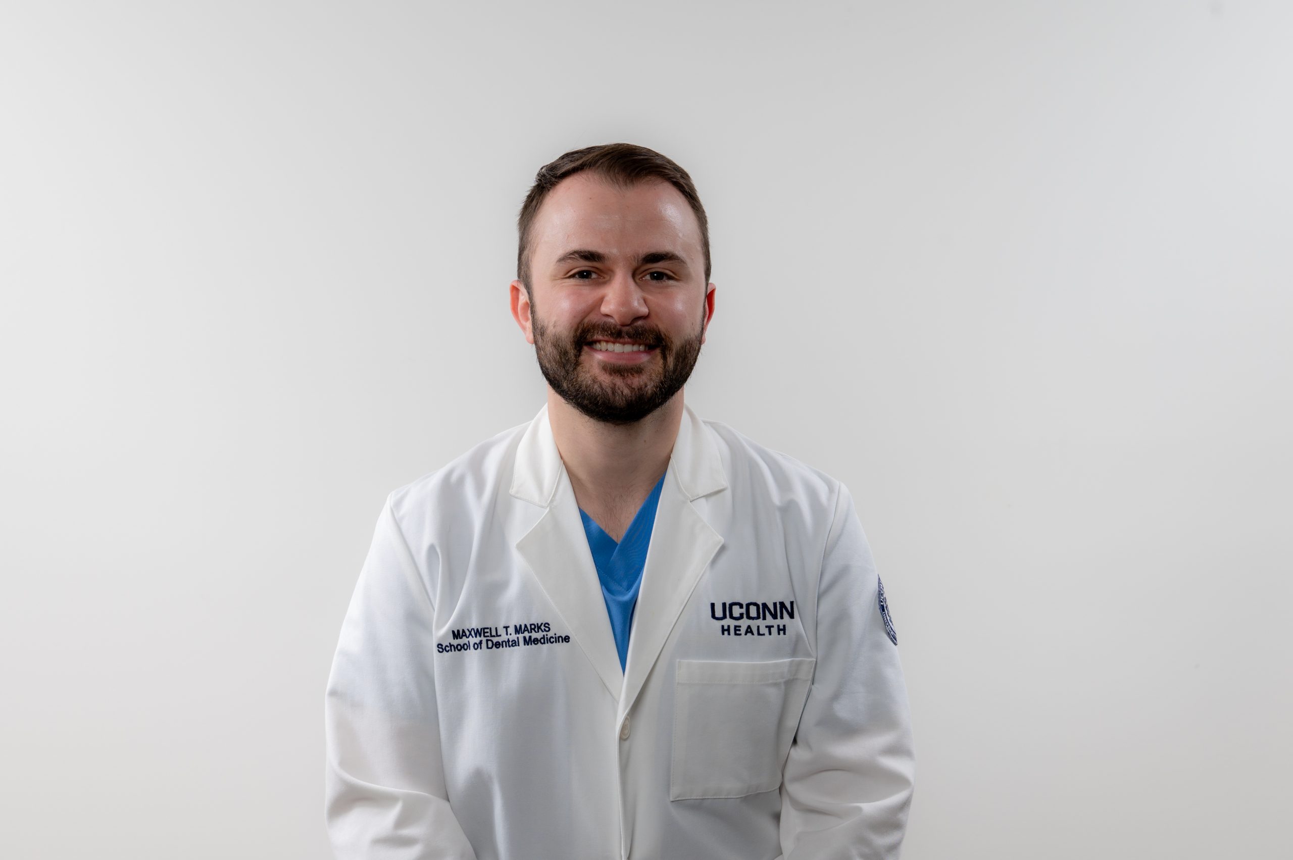 dental student in white coat
