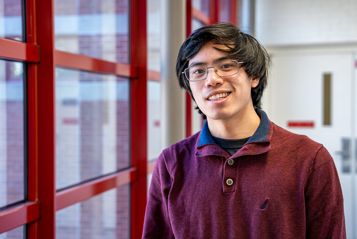 Andrei Abarientos ‘26 (CAHNR), a pathobiology major poses for a photo in the Wilbur O. Atwater Laboratory