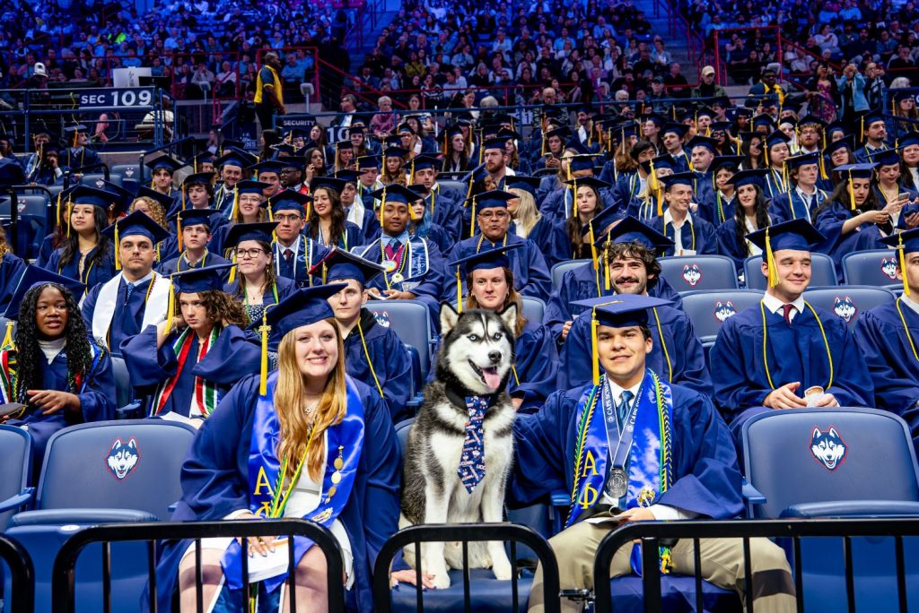 Jonathan XV sits with students at 2026 CAHNR commencement