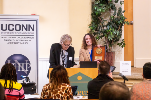 Regina Stankaitis and Cristina Colon-Semenza present during the InCHIP Community Engaged Health Research Forum