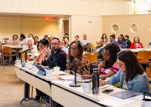 Linda Barry asks a question to a presenter during the InCHIP Community Engaged Health Research Forum