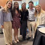 students pose for photo