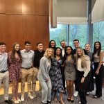 students pose for photo