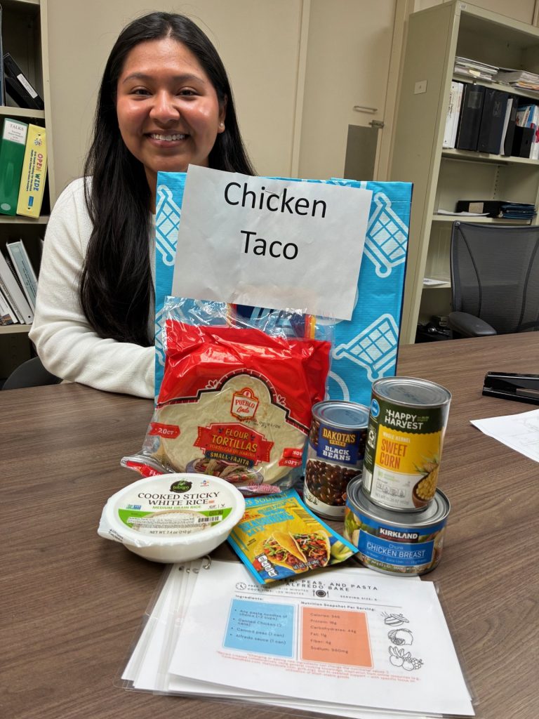 Student Azucena Zecua-Herrera with Chicken Taco bag items