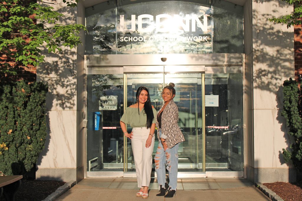 Connecticut ¡Adelante! Scholars Nicole Vega '26 MSW and Jeimy Tiga '26 MSW outside the School of Social Work building in Hartford. 