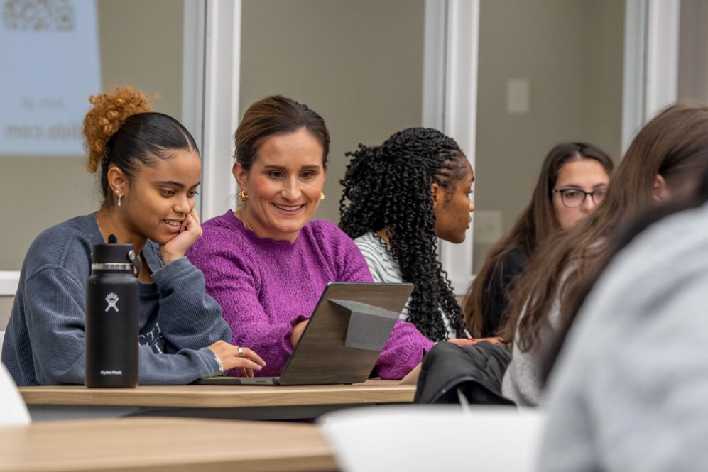 Diana Sobieraj talking with students in a classroom