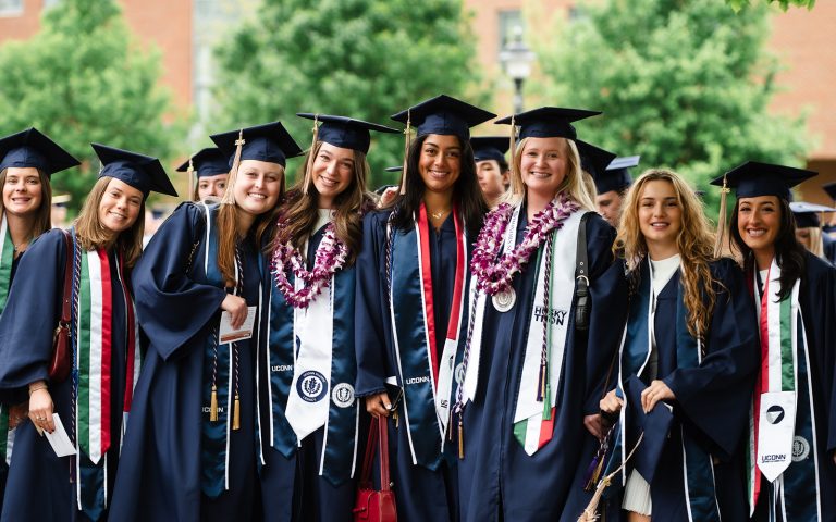 a group of UConn students pose during Commencement 2026.