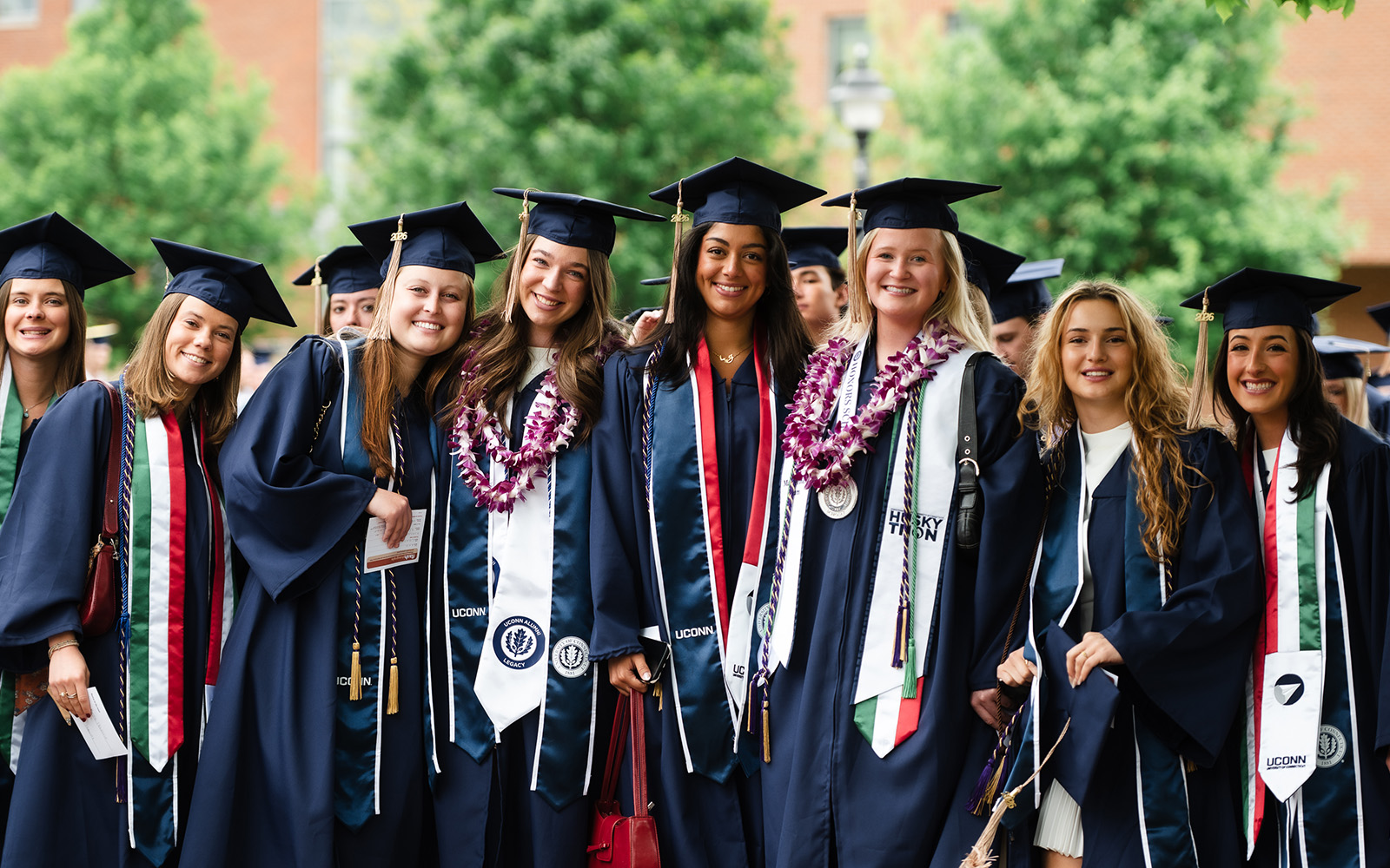 a group of UConn students pose during Commencement 2026.