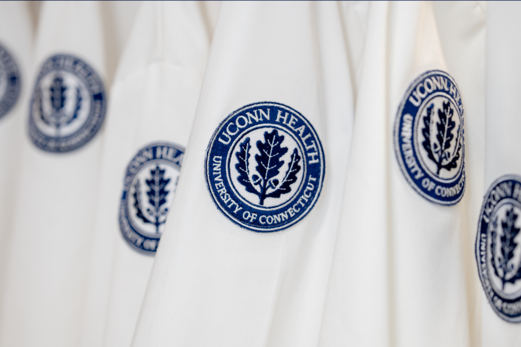 doctor white coat jacket with crest for UConn Health
