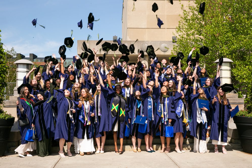 grads tossing caps
