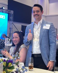 Dr. Christopher Conner stands to be acknowledged at awards ceremomy