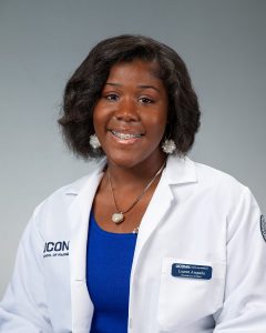 woman in lab coat