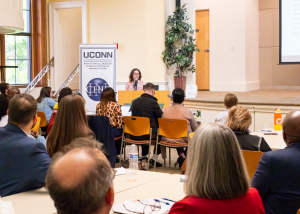 Mayte Restrepo, Assistant Professor in the Department of Public Health, presents during InCHIP's Community Engaged Health Research Forum