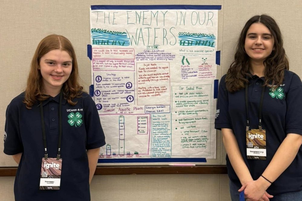 UConn 4-H youth participants present a poster