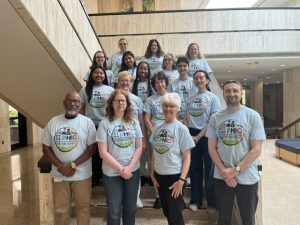 PHIG team at UConn Health in academic lobby.