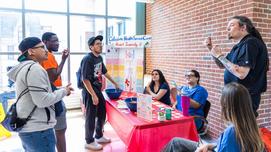 Students and exhibitors speak during WISHfest 2026.