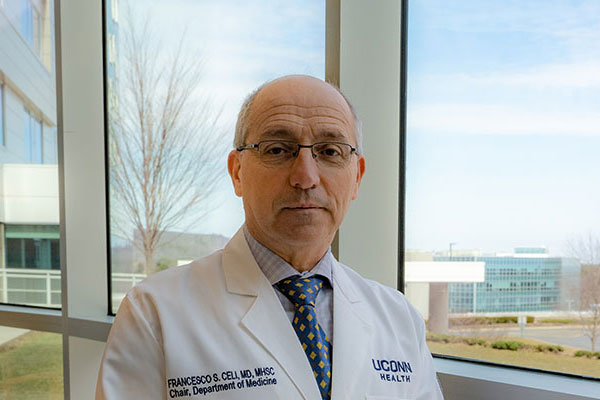 Dr. Francesco Celi environmental portrait white coat