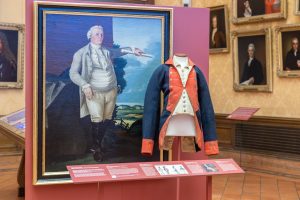 A coat from the revolution sits on display