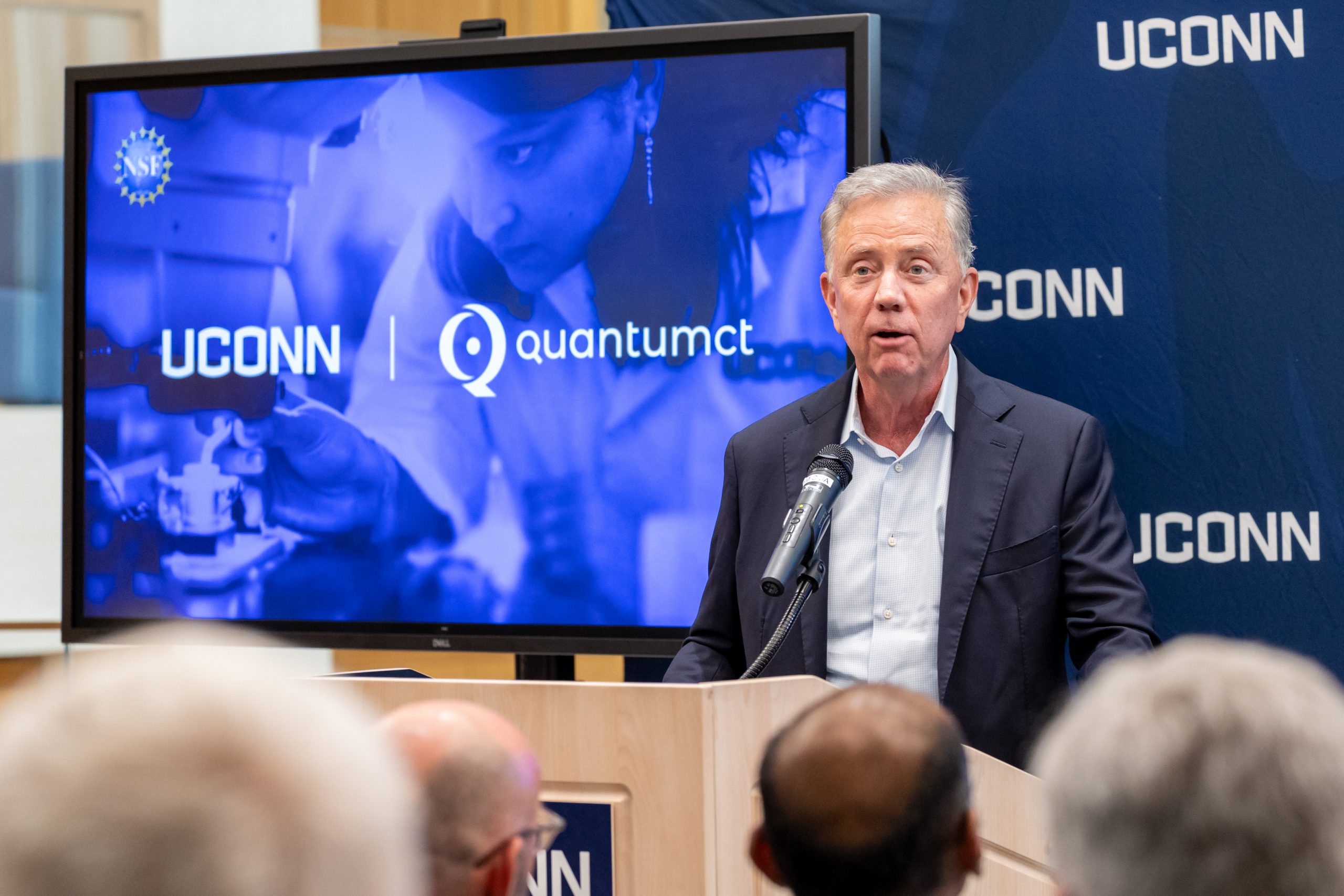 A man at the podium speaking