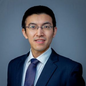 Faculty member Chang Liu poses for a professional headshot.