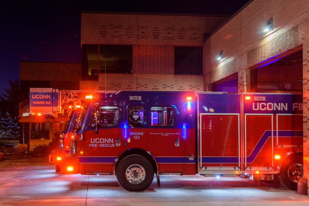 A fire truck with lights on