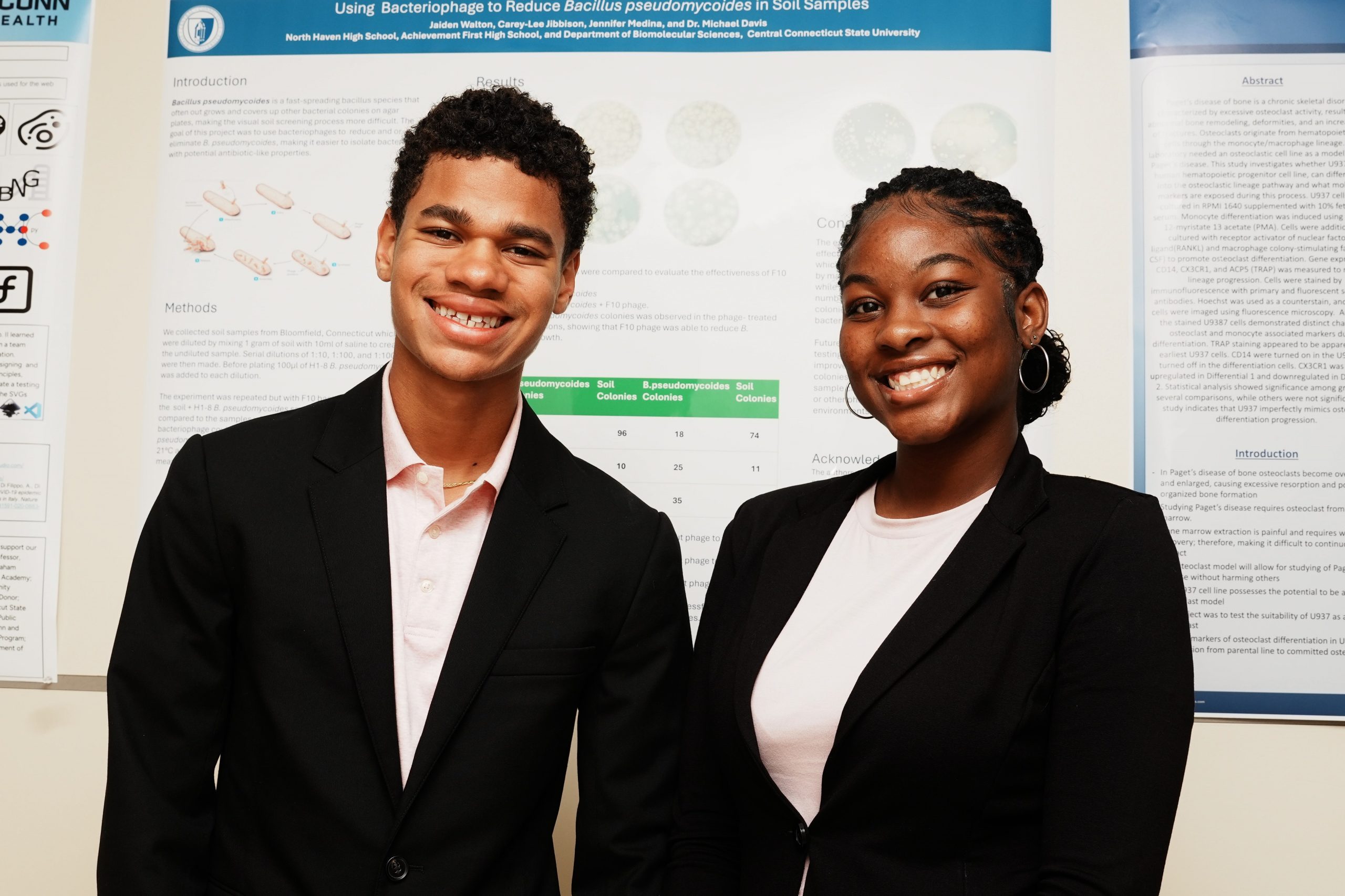 Co-researcher Jaiden Walton from North Haven High School presented with co-researcher Carey-Lee Jibbson at the event (Photo by John Atashian).