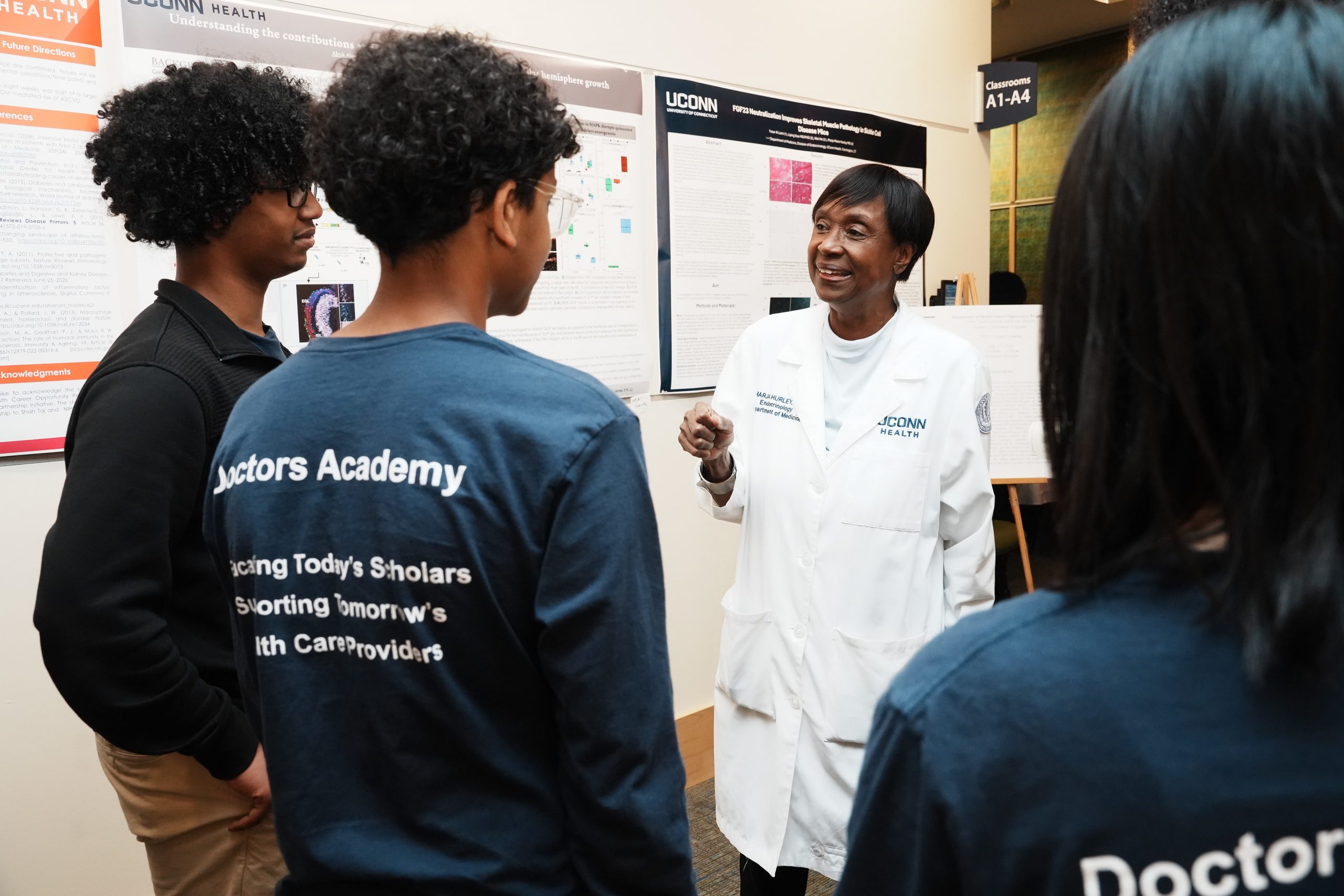 Dr. Marja Hurley speaking with the youth of CT at the event.