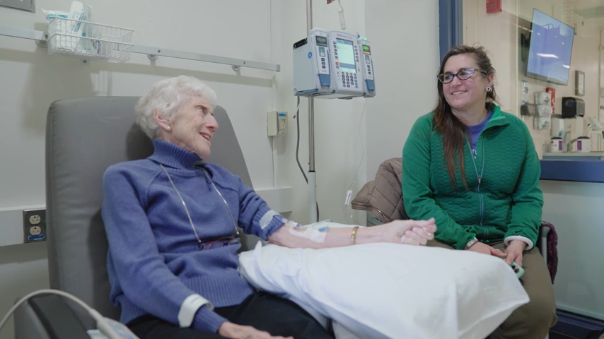 Myasthenia gravis patient Jean Barden talking with her daughter Allison while she receives an infusion treatment at UConn Health. (Ryan Bernat/UConn Health)