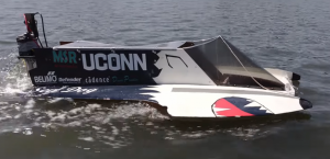 UConn student-designed autonomous boat floats on the water during testing.
