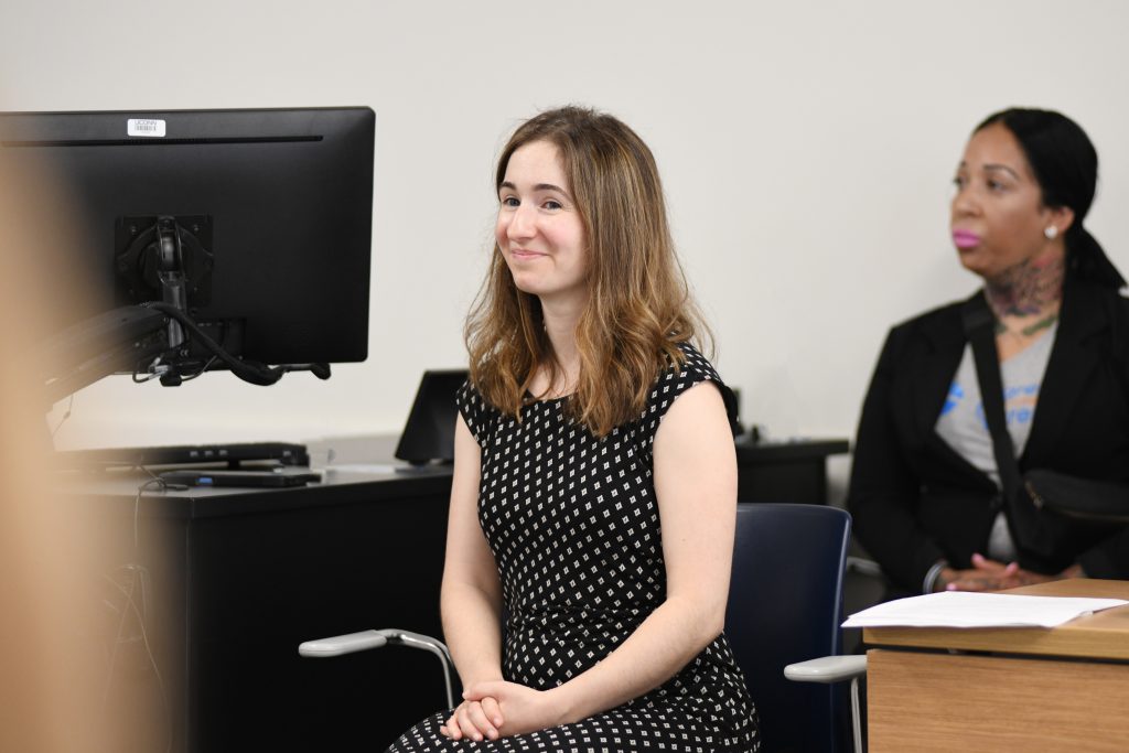 Samantha Lawrence, assistant research professor at the UConn School of Social Work, shares the results of the 2025 Connecticut Parent/Caregiver Survey during a press conference July 22.
