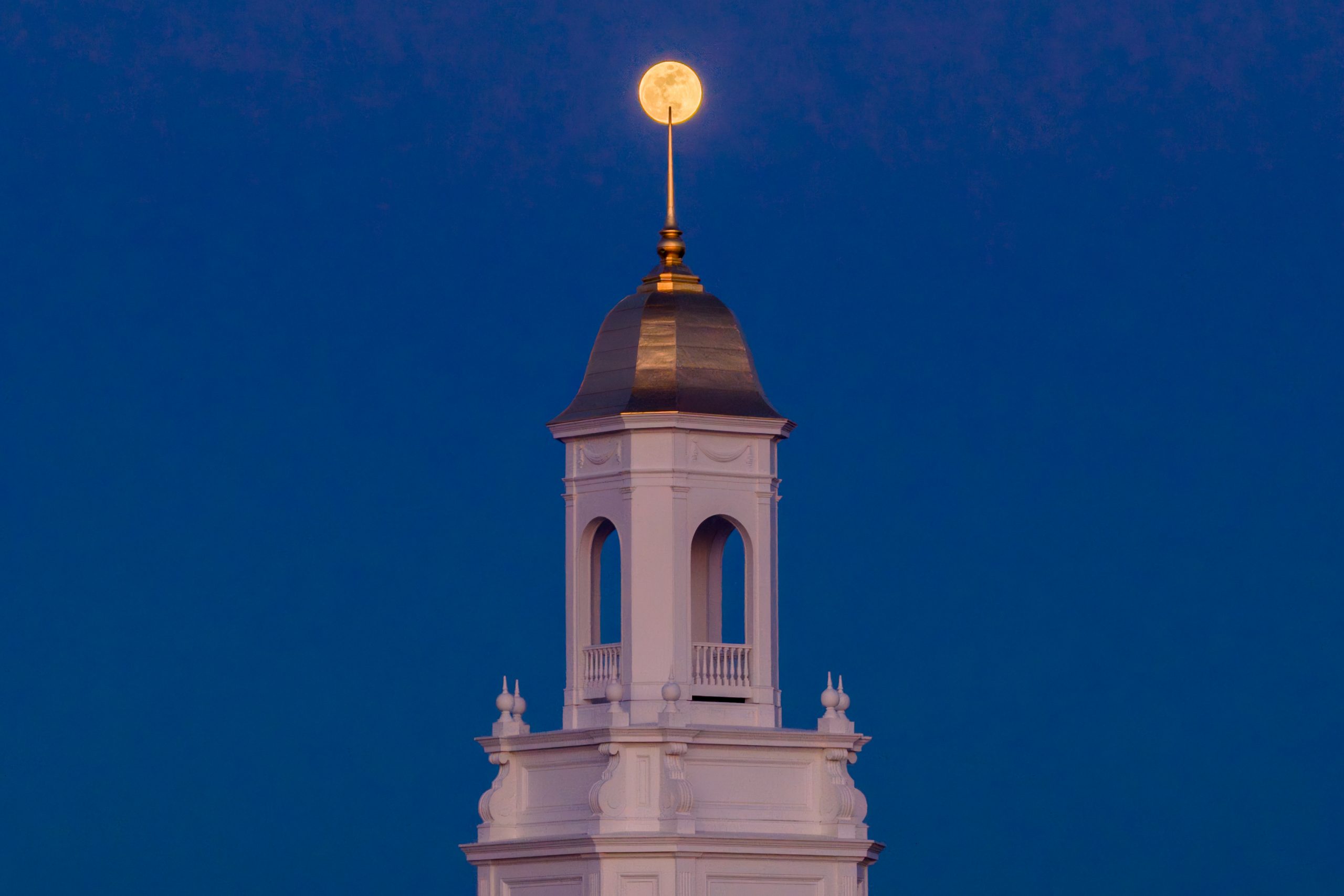 A full moon above the Wilbur Cross cupola. Awesome photo by Syd Herdle.