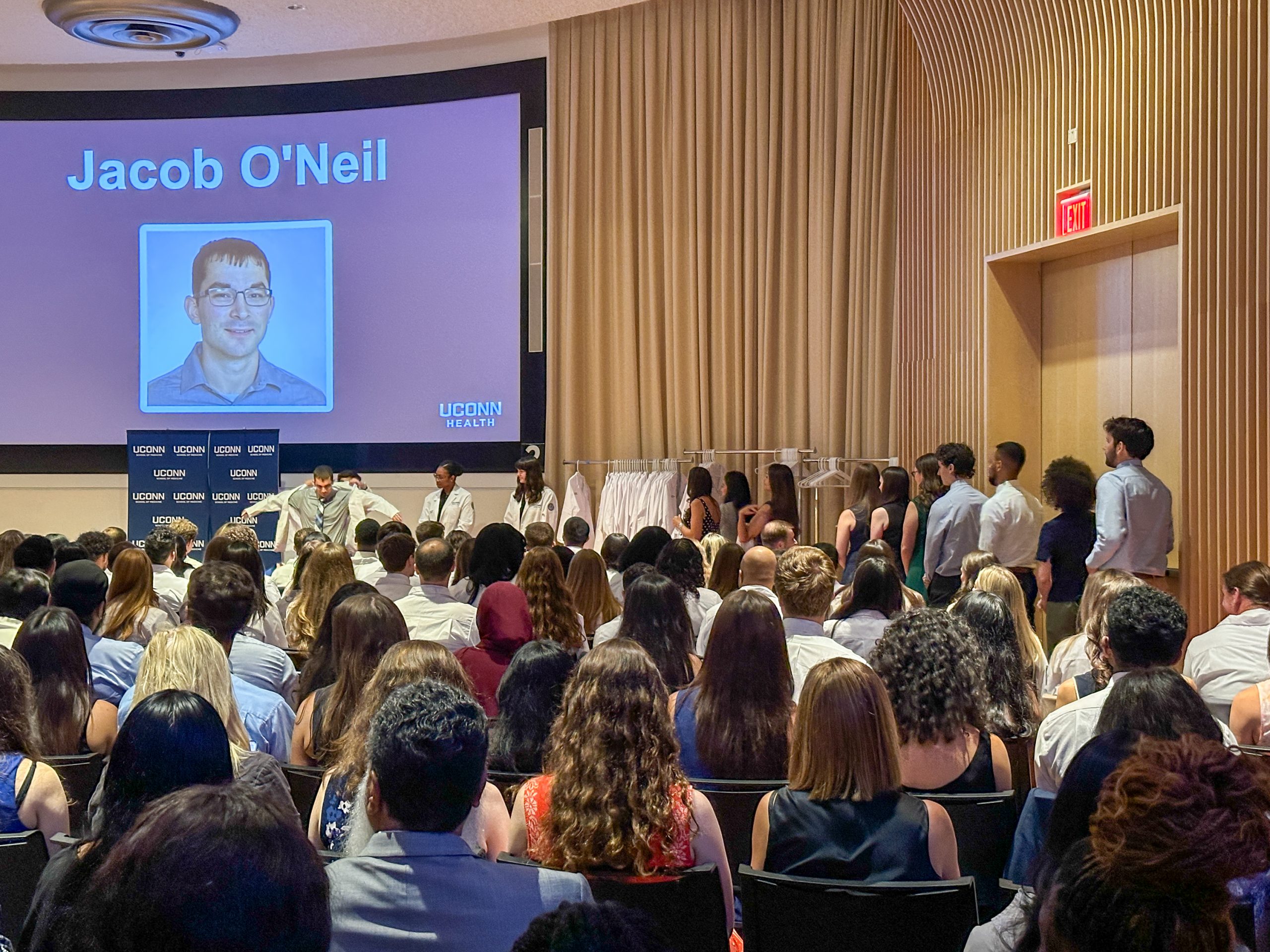 Jacob O'Neil getting white coat