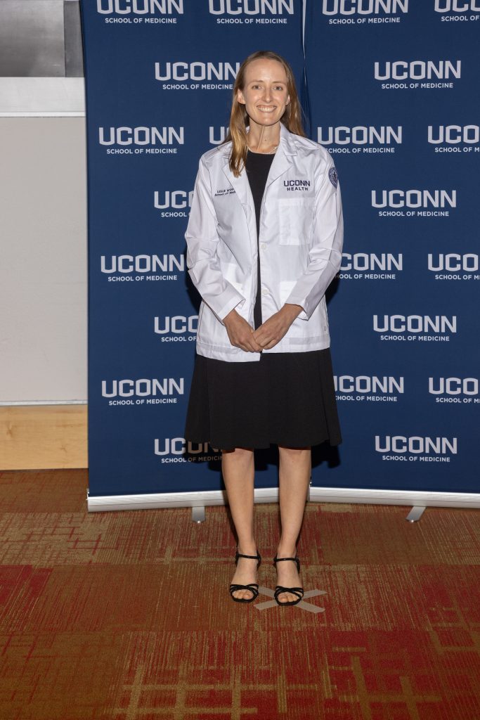 Leslie Wynveen in white coat (UConn Photo/Thomas Hurlbut Photography).