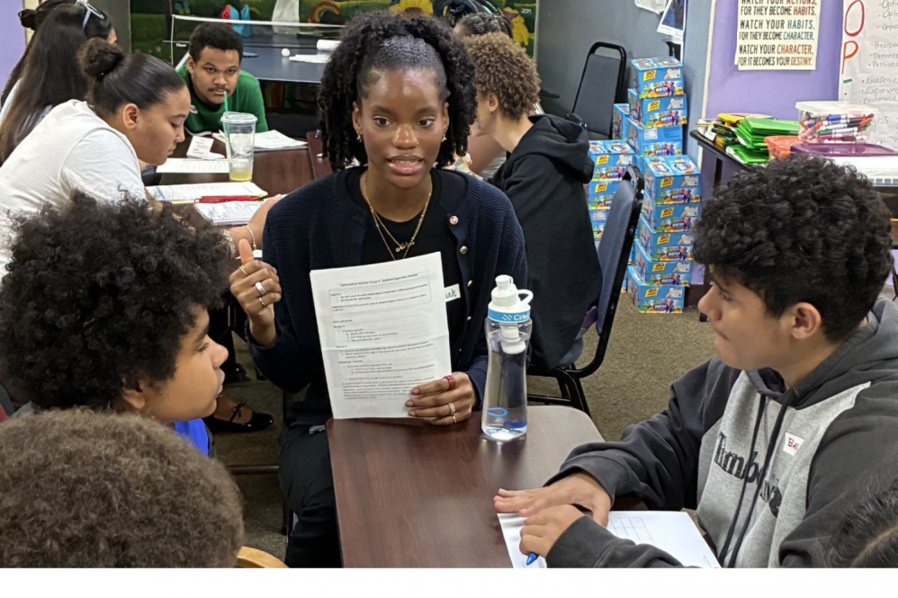 Naliah Grannell instructs teens on the role of an epidemiologist in a foodborne illness outbreak. (CT AHEC Photo).