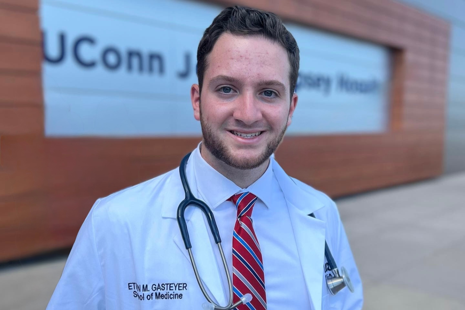 Ethan Gasteyer in white coat