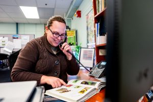 Woman on the phone smiling