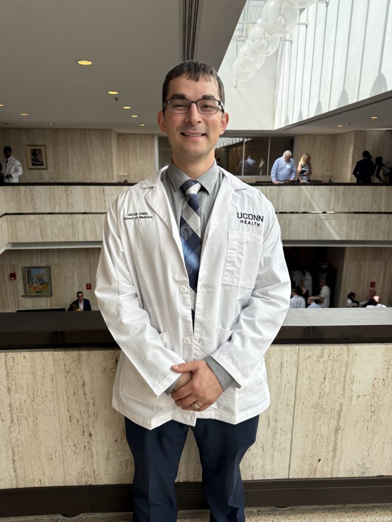 Jacob O'Neil 2026 UConn School of Medicine White Coat (Photo by Lauren Woods)