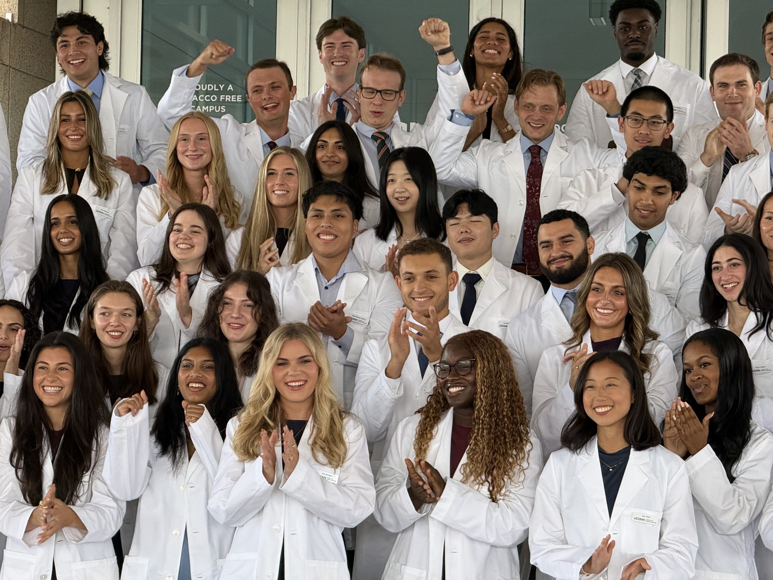 students in white coats