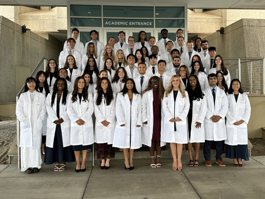students in white coats