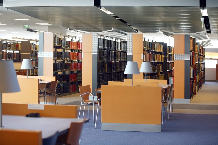 Tables and chairs in an empty library