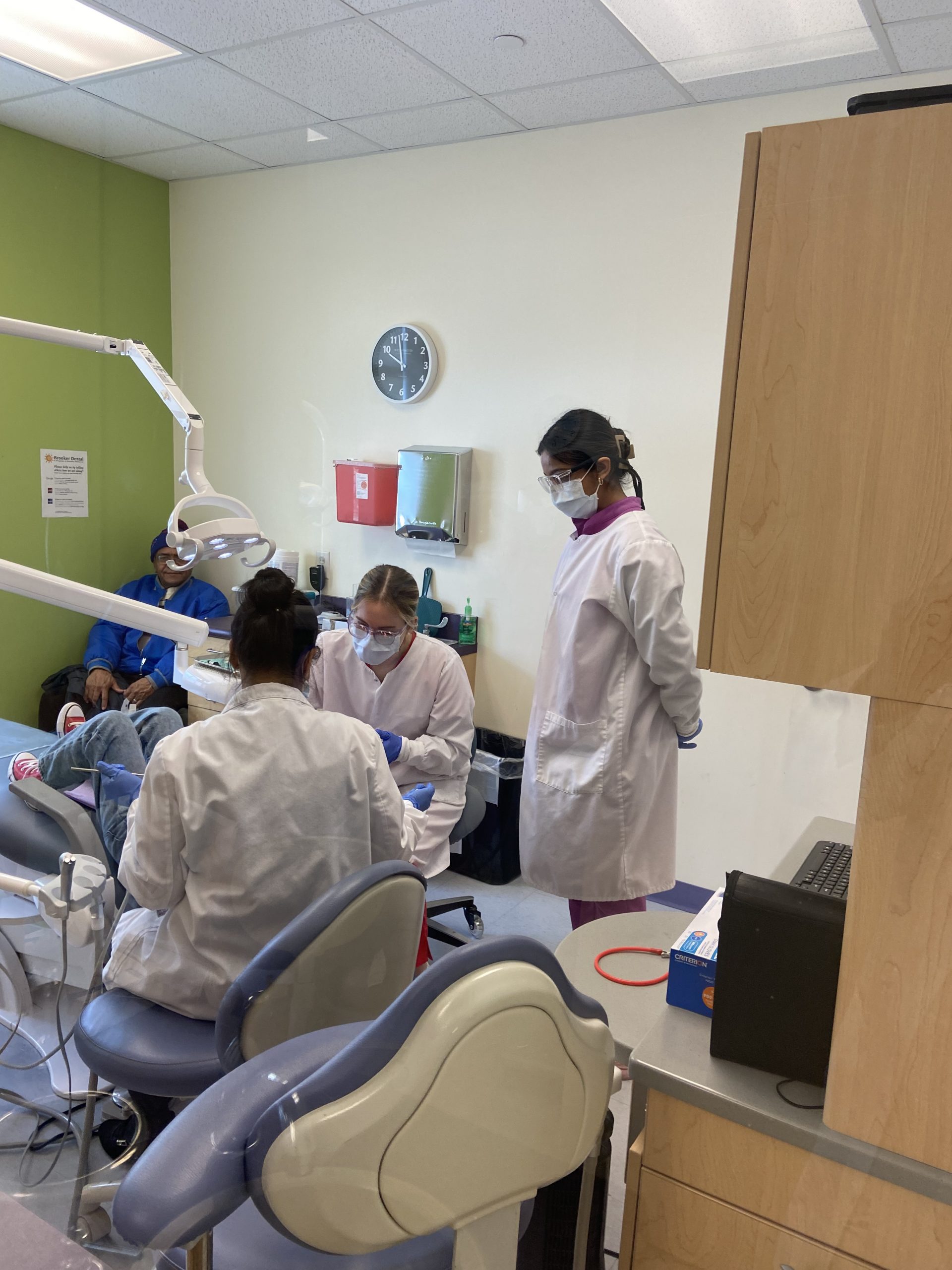 dentists treat patient