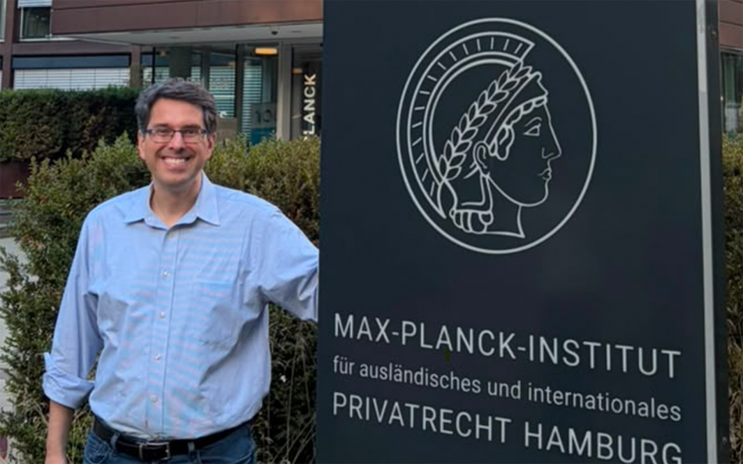 Professor Robert Bird poses outside the Max Planck Institute in Germany.